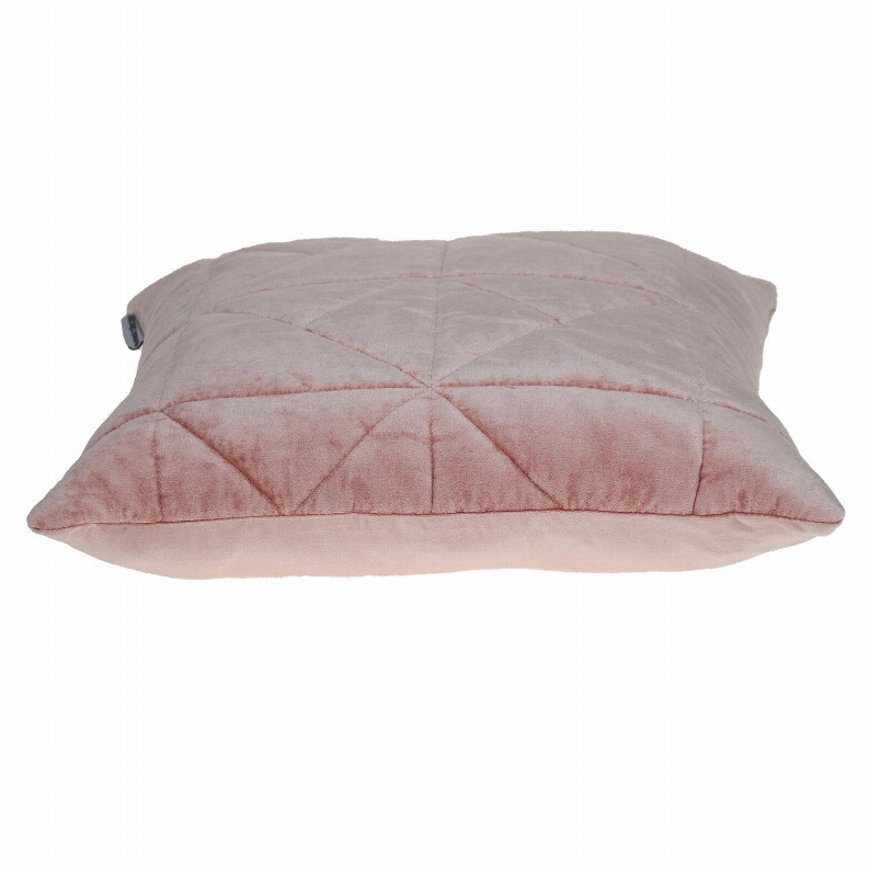Pink quilted throw pillow back with stitched channels and small side label
