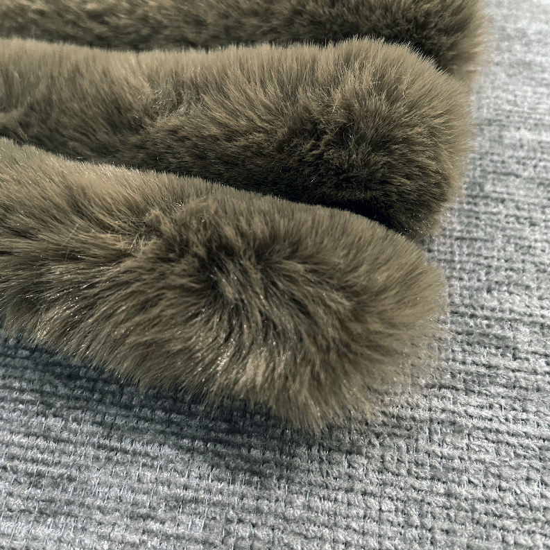 Olive faux fur throw close-up showing dense plush loops