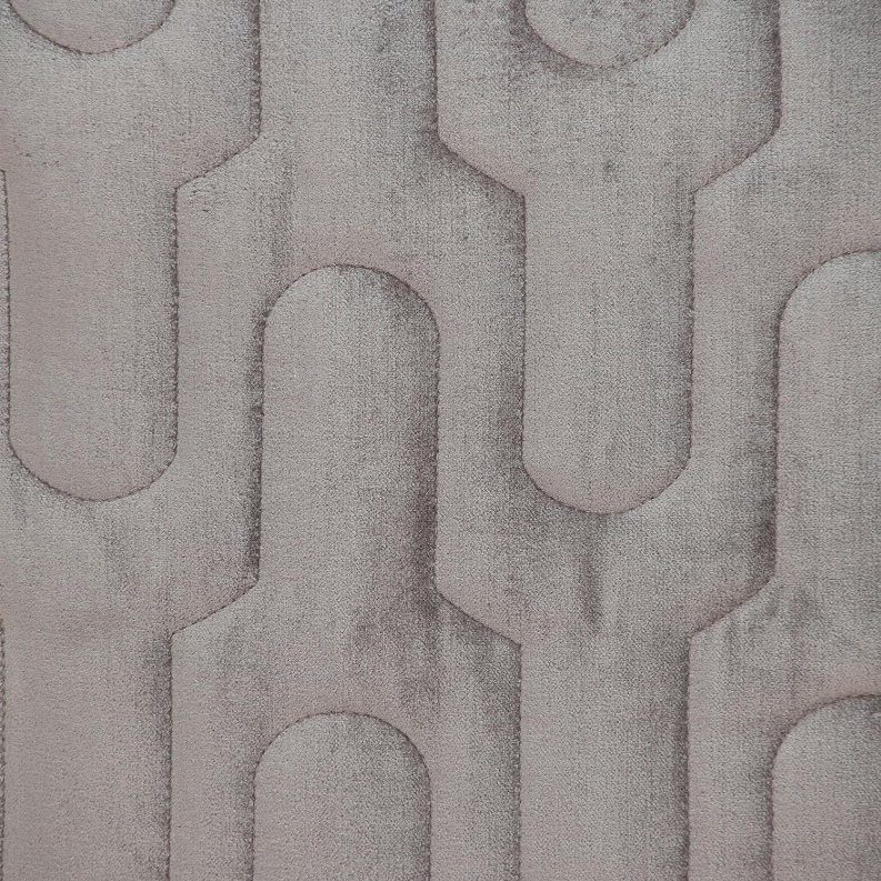 Gray quilted geometric pattern throw pillow fabric close-up