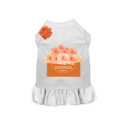 White dog dress with orange flower bow and rose print panel, ruffled hem