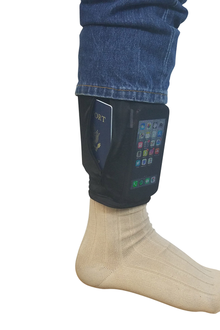 Black leg stash pouch with clear window on jeans cuff over tan sock