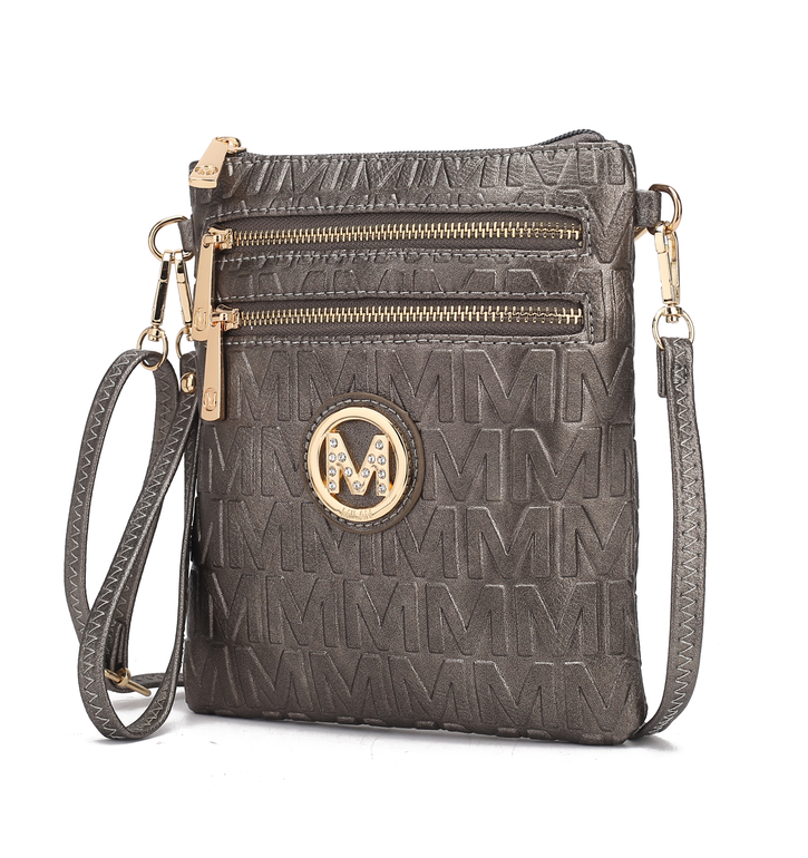 Dark gray crossbody handbag with gold logo medallion, zip front and adjustable shoulder strap