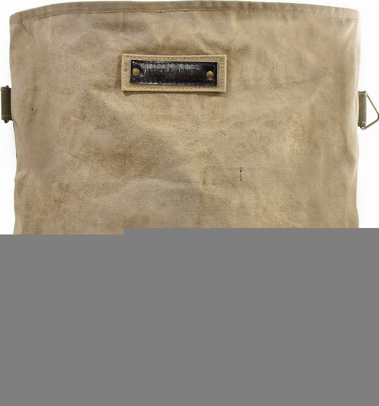 Recycled military tent crossbody bag back with rectangular label patch and side strap
