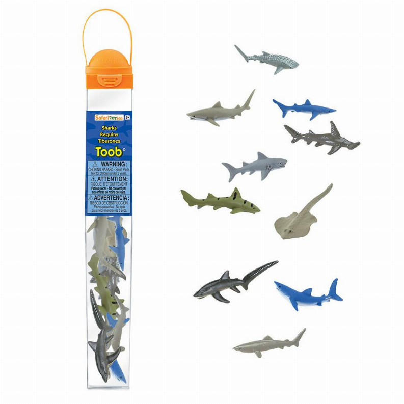 Assorted plastic shark figures in clear blister pack with orange hanging card
