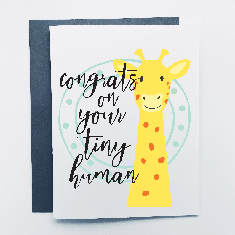 Baby greeting card with yellow giraffe and 'Congrats on your tiny human' message