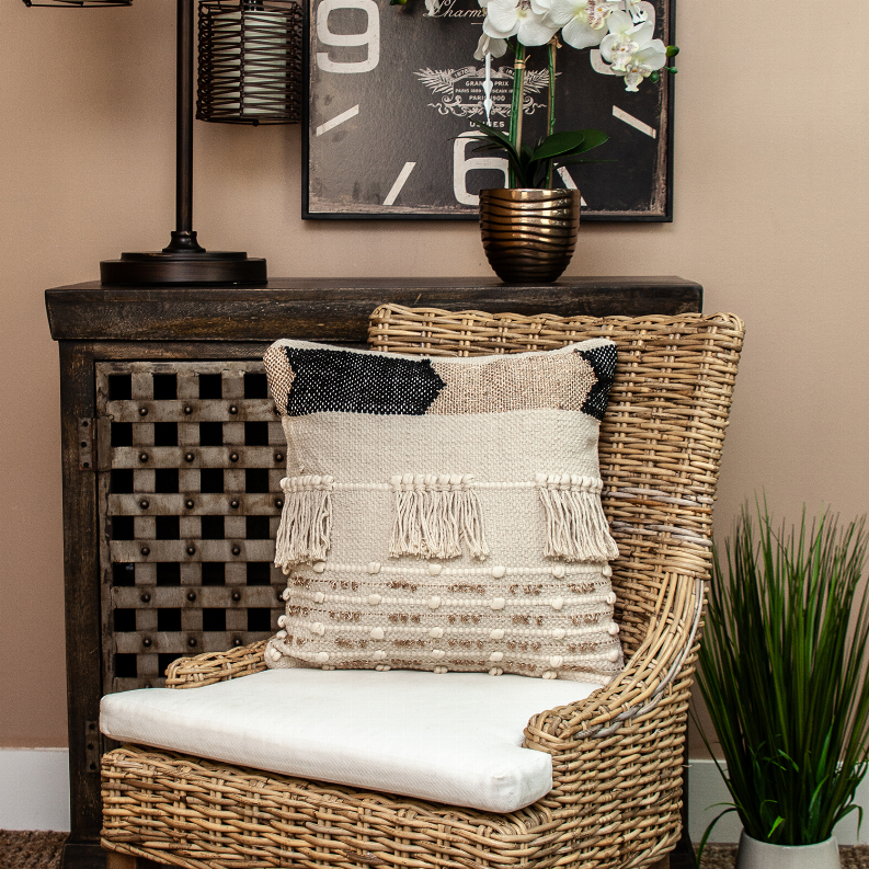 Beige woven throw pillow with stacked stripes and tassel trim, square