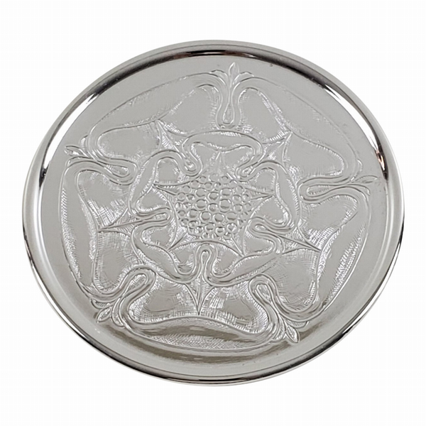Round silver plate coaster with embossed floral rose pattern