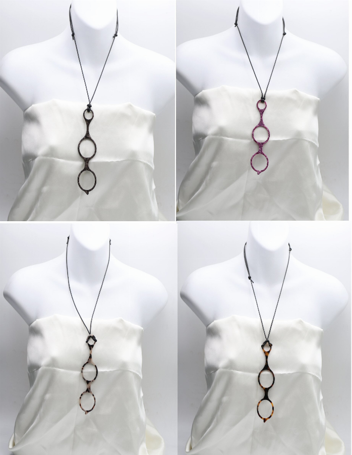Black reading glasses necklace with oval link chain and mixed frame pendants in dark and gold tones