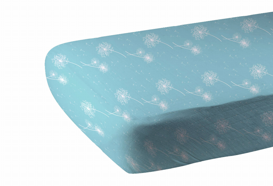 Teal bamboo crib sheet close-up with white dandelion seed print