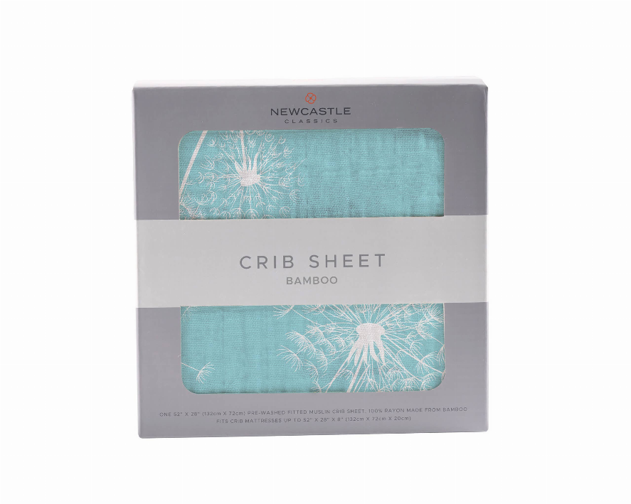 Teal bamboo crib sheet box with dandelion seed design