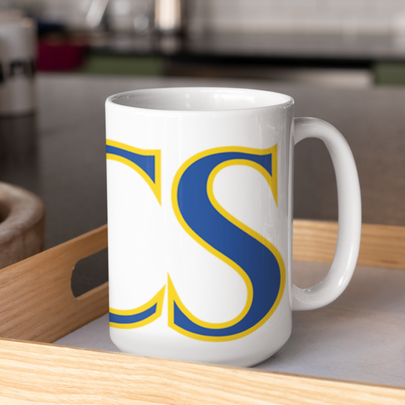 White ceramic coffee mug with NWC logo in blue and yellow, full side view.