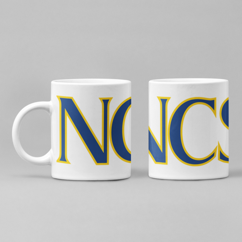 White ceramic coffee mug with large blue-and-yellow NWC letters and round handle.