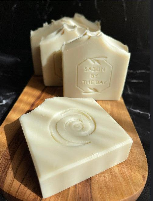 Ivory Castile olive oil soap bar with embossed spiral design