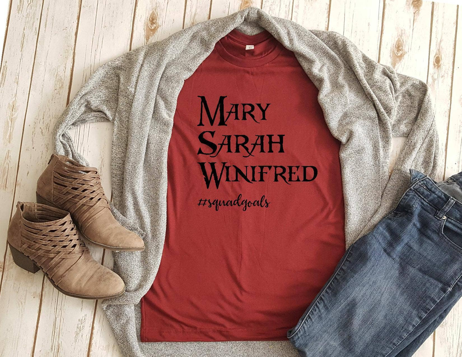 Red crew-neck graphic T-shirt with large 'Mary Sarah Winifred' print and #squadgoals