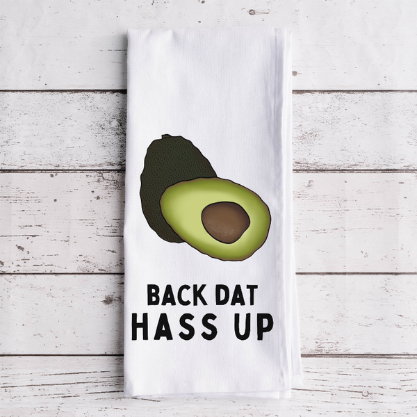 White tea towel with avocado graphic and “BACK DAT HASS UP” text