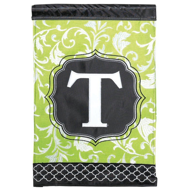 Black and green monogram flag with large white 'T' emblem