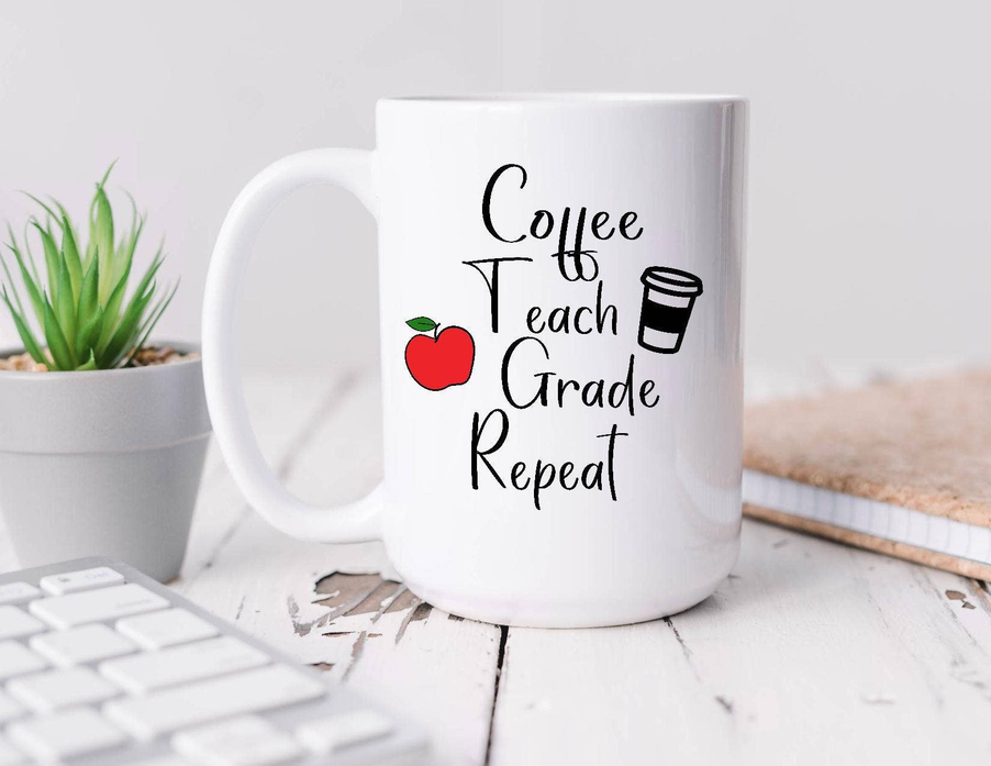 White coffee mug with 'Coffee Teach Grade Repeat' quote, apple and coffee icon
