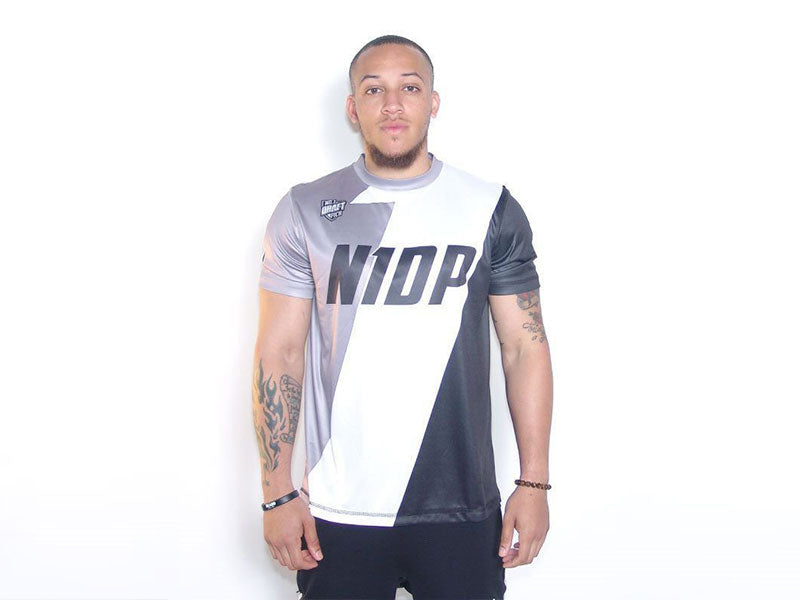 N1DP Dri-Fit t-shirt front with large white diagonal panel and dark side sleeves