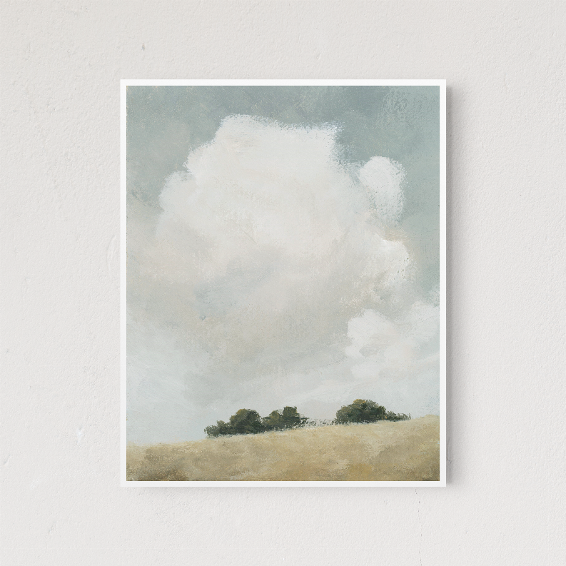 Square wall art print with cloudy sky, green treeline, and beige grassy hill