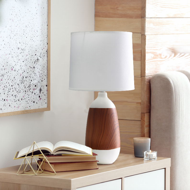 Ceramic oblong table lamp with white drum shade and dark woodgrain base
