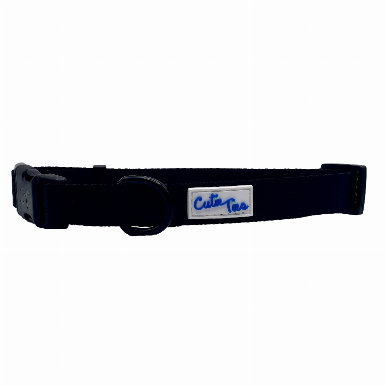 Navy dog collar with blue Cutie Ties nameplate and metal buckle