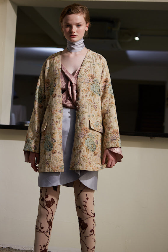 Sheer printed leggings in light beige with dark brown bird-on-branch motif