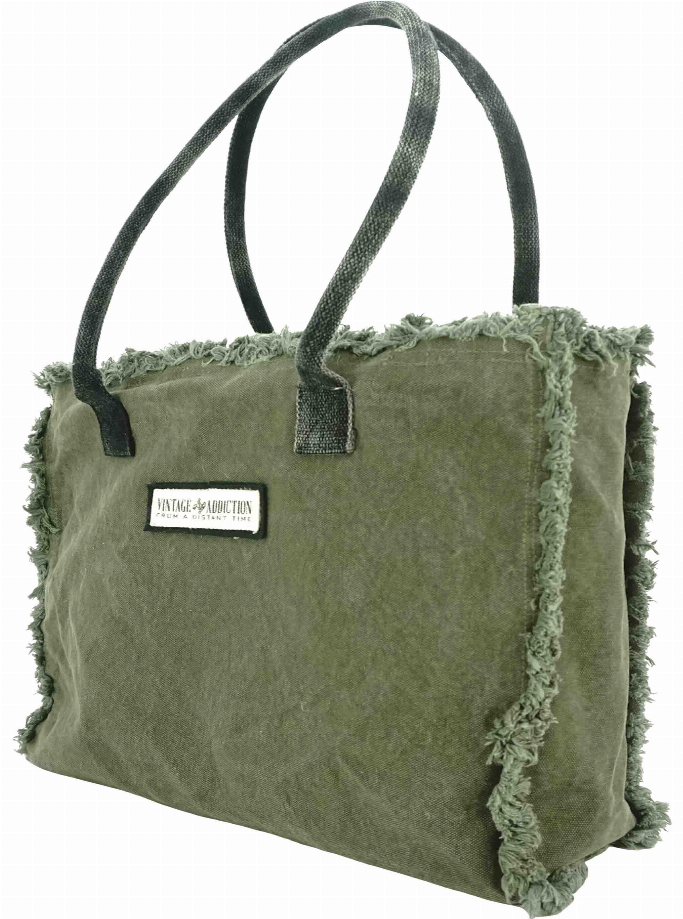 Olive canvas market tote with dark handles, frayed edges, and fabric logo patch