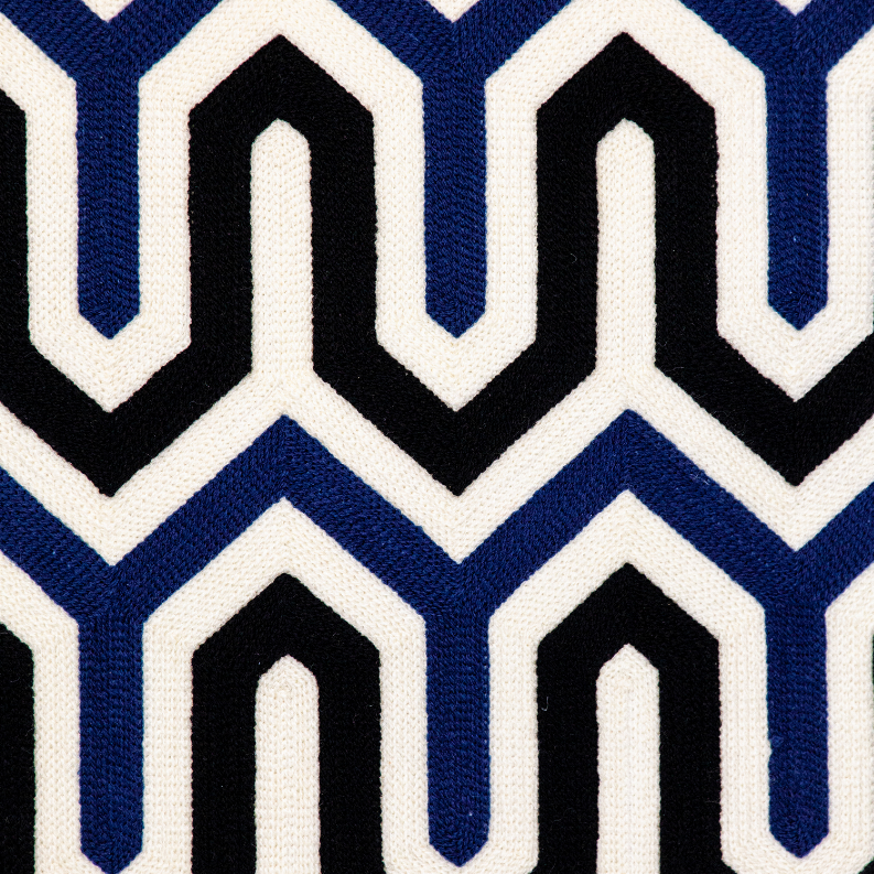 Chevron zigzag throw pillow fabric with blue, black, and white geometric pattern