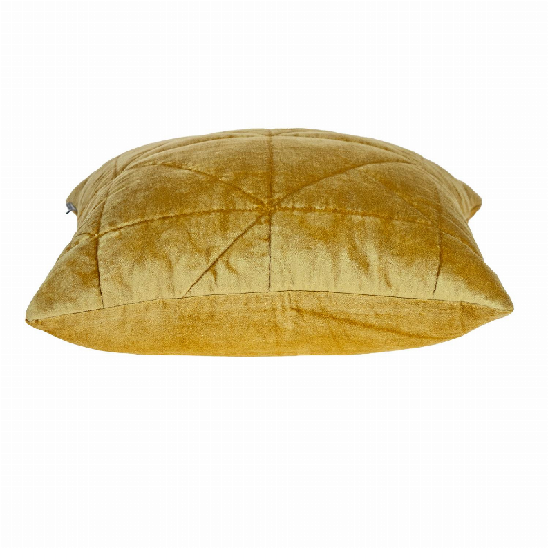 Mustard yellow quilted throw pillow viewed from above with centered diamond seam