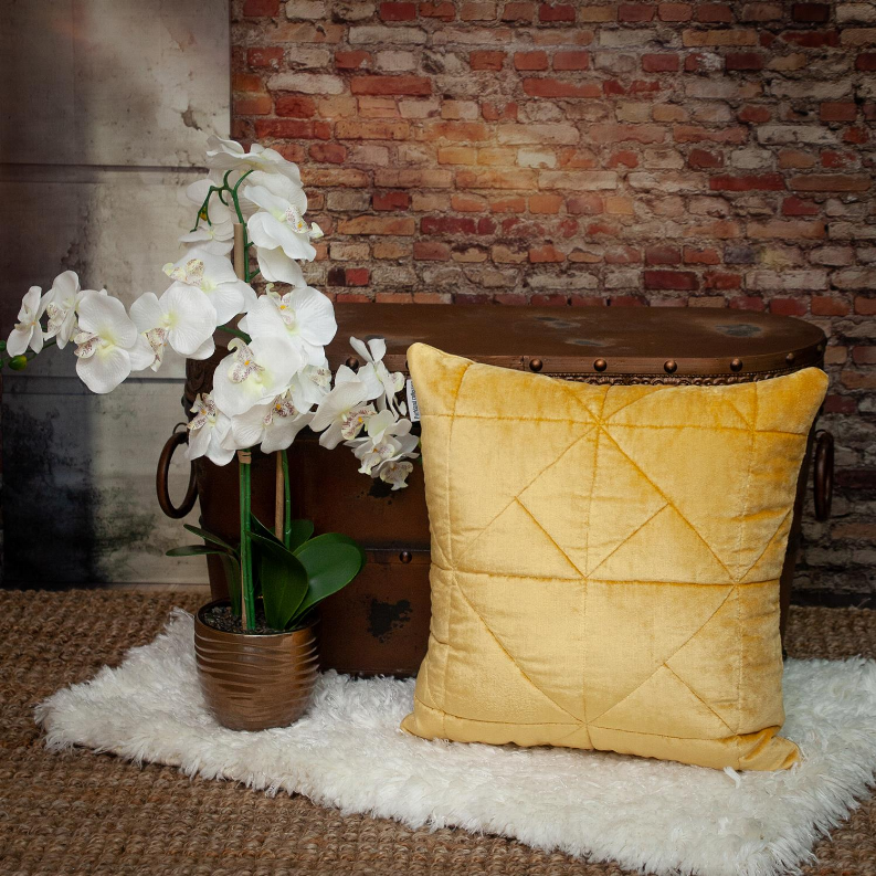 Mustard yellow square throw pillow with quilted diamond pattern and matching back