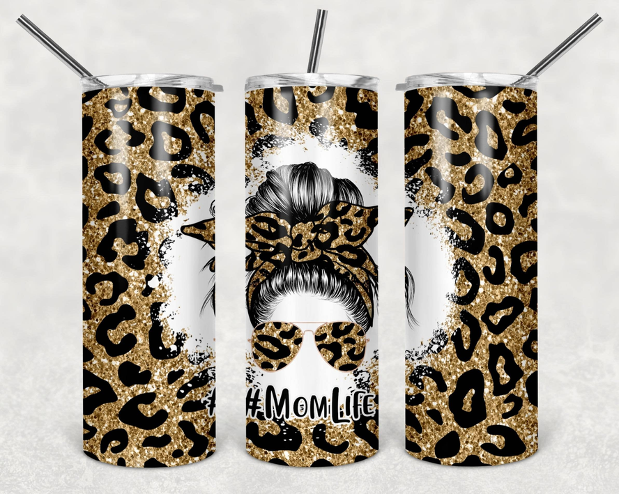 Stainless steel tumbler with gold leopard-print design and two clear straws