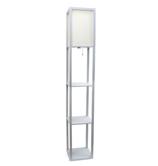 Tall metal column floor lamp with linen shade and three-tier shelf base