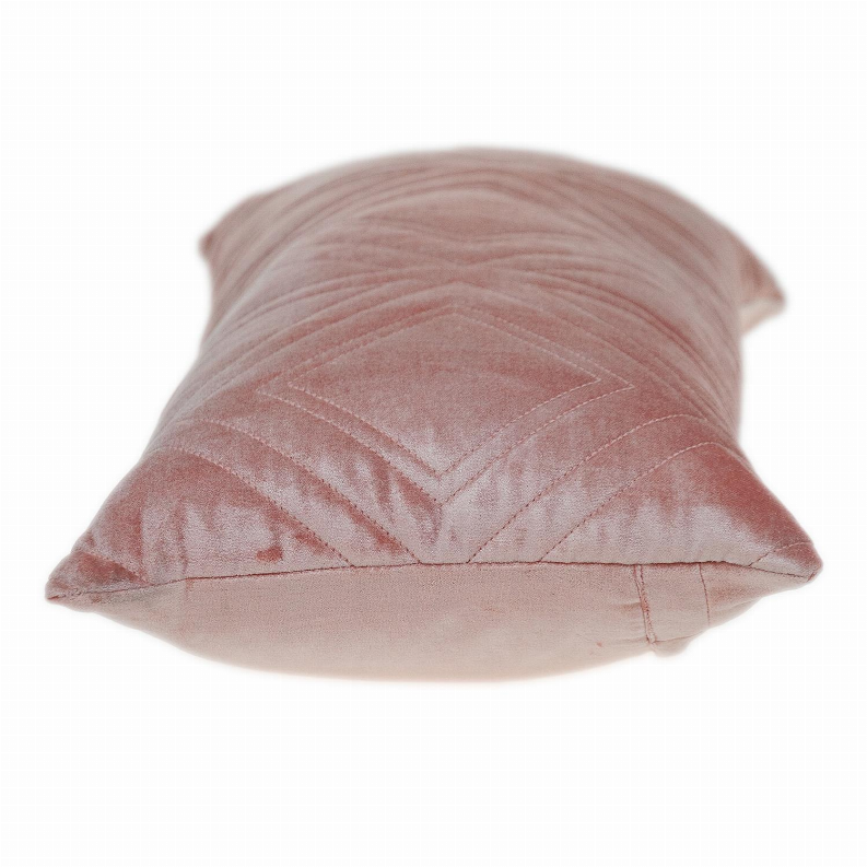 Pink quilted throw pillow featuring stacked diamond chevron stitching and trim seam