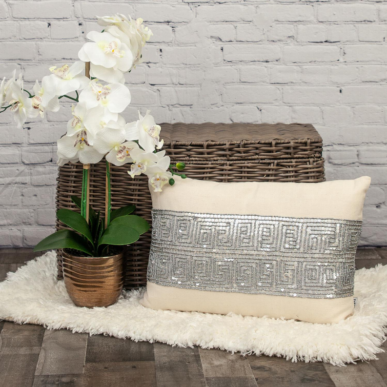 Cream throw pillow with blue-gray geometric sequined embroidery front panel