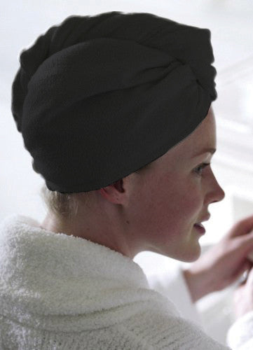 Black microfiber hair turban towel on a person’s head