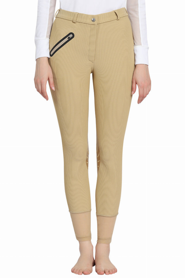 Tan ribbed riding breeches with silicone knee patches and ankle cuffs