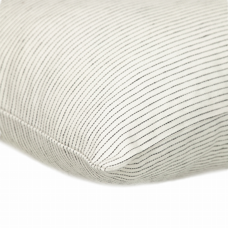 Light cream pillow cover with thin vertical dark stripes and stitched edge