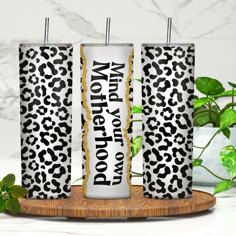 20oz skinny tumbler with white and black leopard print wrap, silver lid and straw