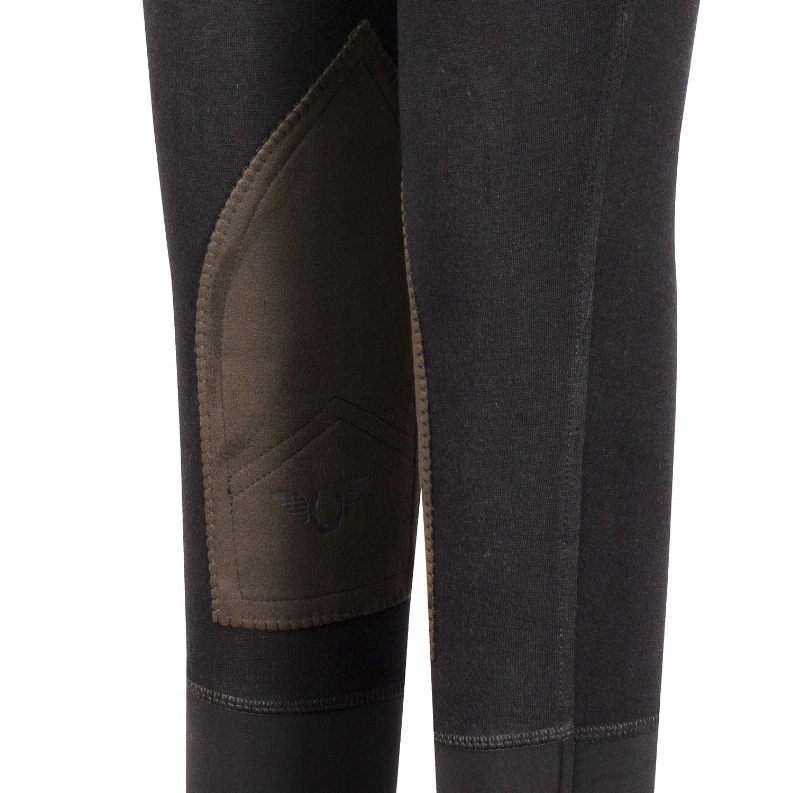 Boys riding breeches with brown stitched knee patch on dark leg