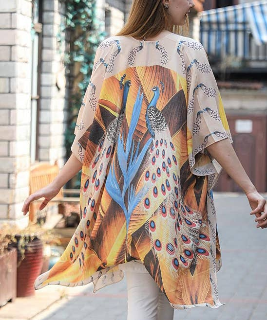 Cotton kimono with light base peacock print in blue and orange, open back