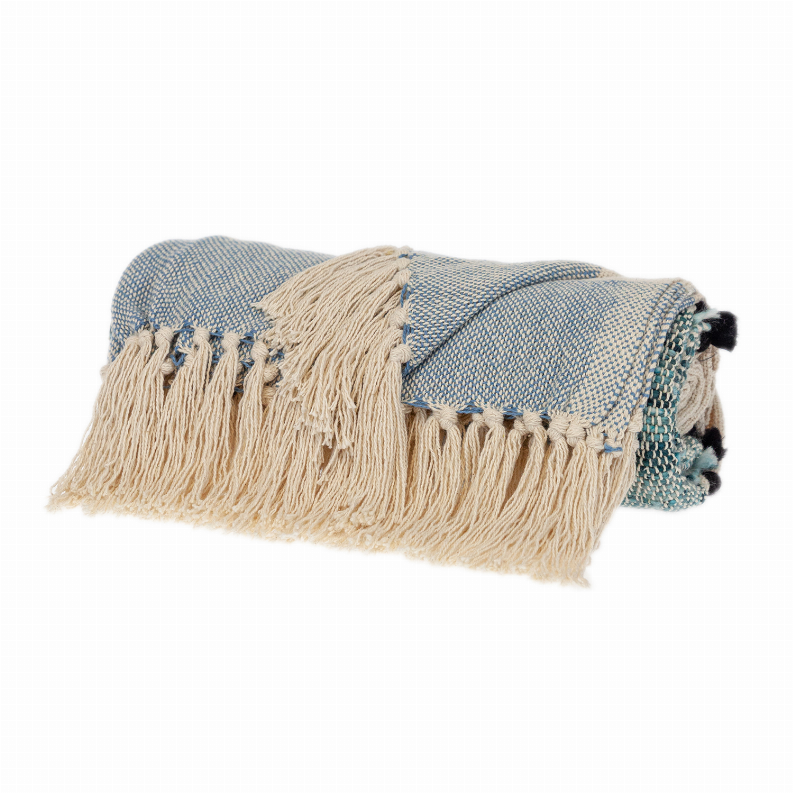 Rectangle throw blanket in cream and light-blue blocks, fringed hem, black pom-tassels.