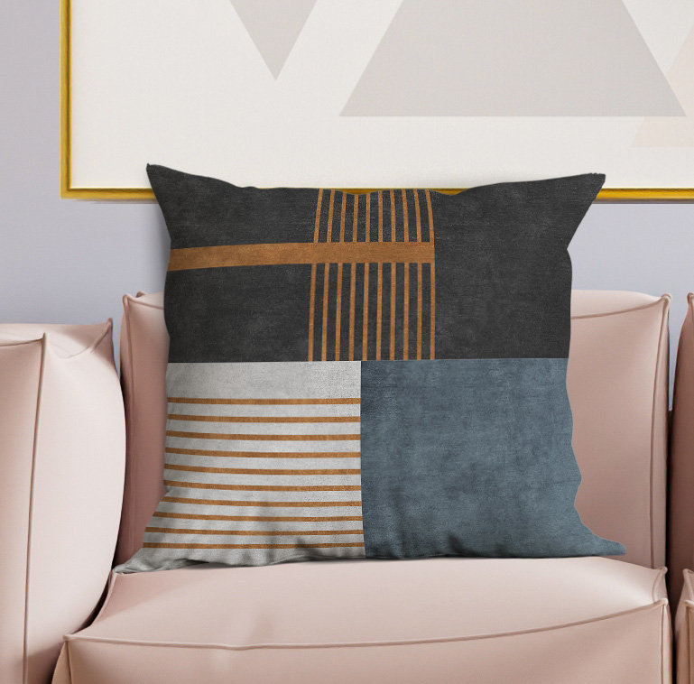 Decorative throw pillow with charcoal, denim-blue, and tan geometric stripe panels