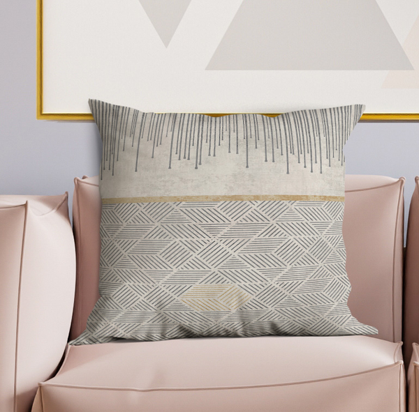 Square decorative pillow, gray ruler stripe top and geometric pattern center.