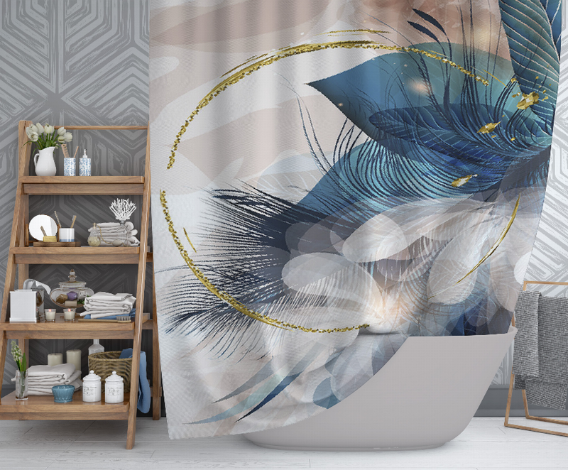 Multi shower curtain with blue feather artwork and gold-trim edge, hung over shower tub