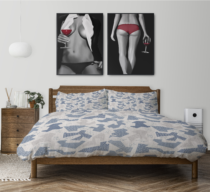 Blue and white geometric comforter set with two pillow shams on bed
