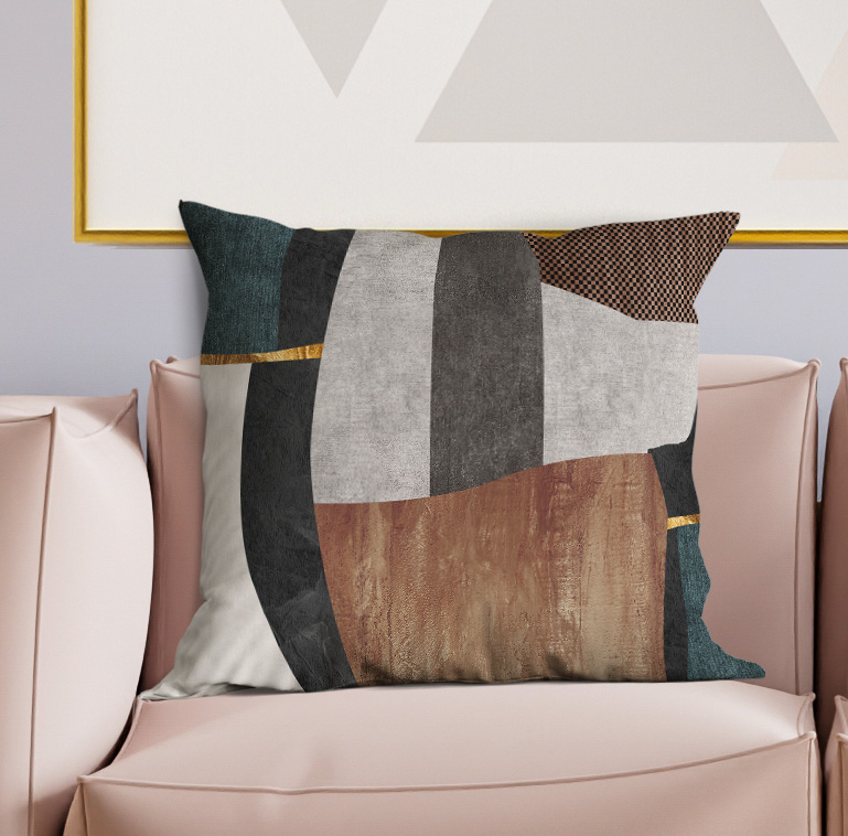 Multicolor geometric patchwork throw pillow with teal, gray, rust, and black stripes