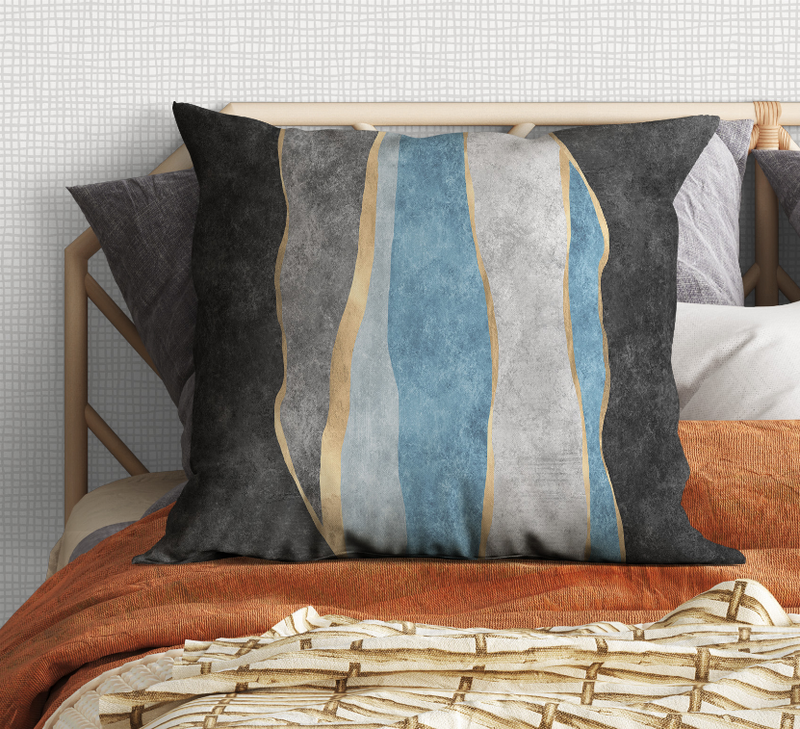 Charcoal square pillow featuring vertical abstract stripes in blue, white, and tan