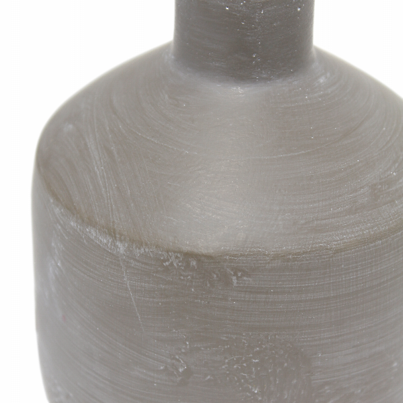 Gray ceramic lamp base with textured surface, close-up