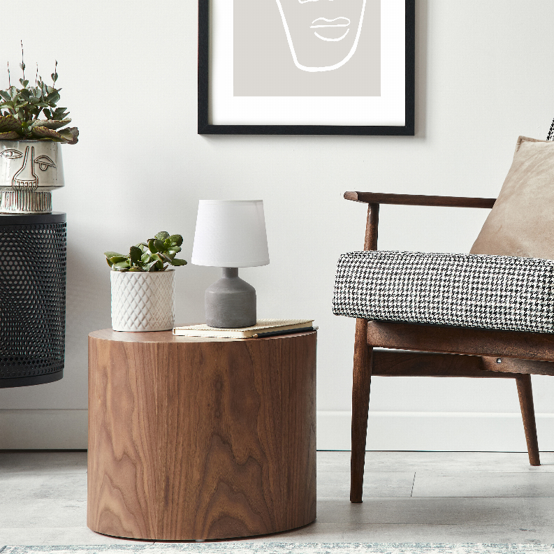 Round walnut-toned ceramic table lamp with white drum shade