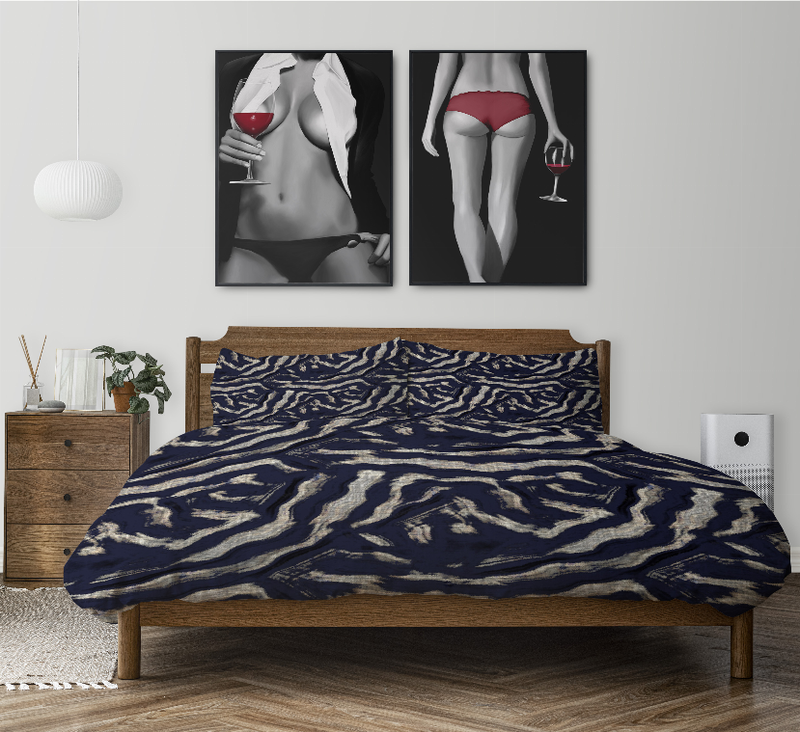Navy abstract swirl comforter set on bed with two matching pillow shams